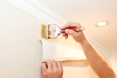 Pose de papier peint à Touget — revêtements muraux et toiles de verre